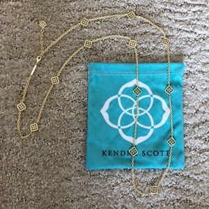 Gold Kendra Scott logo long necklace